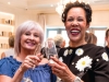 Guest celebrating with Noreen Meijias-Bennett (right)