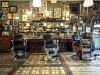 The shop features plenty of antiques and paraphernalia, from the chairs to the photos, to give it that authentic feel. Clients have been known to wait in line for four to five hours for a cut and shave
