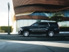 Character lines cut along the side of the 2015 Escalade, elongating its already massive profile