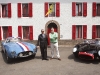 Rob Myers, RM Auctions’ chairman  and founder proudly stands by  two star attractions at the Ferrari Leggenda e Passione event in Maranello, Italy in May 2009.