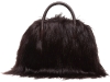 Furry and Fierce: Have all the attention on you with this soft, stylish satchel by Laura Buccellati. Its fine leather handle feature adds a touch of character.