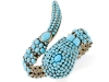 Available from Iris Apfel’s Home Shopping Network line, this turquoise snake charmer multi-stone cuff bracelet gives a ssslender, sssensational look. Photo By Vanessa Lenz Photography