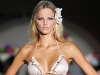 Madrid Fashion Week proved that a flower hair accessory, when done right, can add extra femininity to any bikini ensemble.