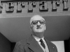 Enzo Ferrari at the entrance of the Ferrari Factory, 1957