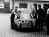 Enzo Ferrari with the 125 S in the courtyard of Fabbrica. At the wheel is Ferdinando Nando Righetti