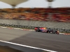 Red Bull Racing’s Sebastian Vettel zips through the track at full speed.