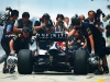 Photo opportunity for the World Press as the Red Bull car comes into the pits after hot laps. (Photo by Lat Photographic)