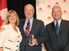 Canadian Club of Toronto president Jennifer Sloan, Martin with his 2014 Lifetime Achievement Award and Canadian Club of Toronto vice-president Fred Mifflin. Photo by Mike Hagarty