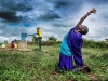 Julius Kapaito Seleka, Amboseli, Kenya, the foothills of Mount Kilimanjaro (Africa Yoga Project)  | Photo by Robert Sturman