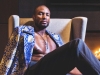 Ibaka poses at the 1500 penthouse suite at One King West Hotel & Residence in Toronto | Jacket - Hendrixroe, Necklace - Finch Centre Jewellers, Belt - Frank and Oak, Trousers - Joao Paulo Guedes, Shoes - Parc City Boots, / Photos by Geoff Fitzgerald