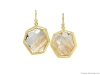 PETRA CLASS: These One of a Kind Heptagon Drop Earrings are handmade from a pair of faceted rutilated quartz, secured on intricate 18-karat yellow gold wires and matte-finished in 22-karat yellow gold | Photo courtesy of 1stdibs