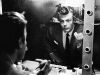 Marcello Mastroianni checks himself in the mirror on the set of La Dolce Vita. Photo By Auturo Zavattini