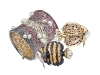 Golden oceanic themed brooches and bracelets