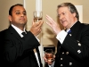 Mahesh Patel analyses the colour of fine whisky next to master blender Richard Paterson.