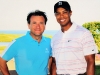 Venture capitalist Robert Herjavec with professional golf player, Tiger Woods.