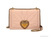 DEVOTION MEDIUM QUILTED CROSS-BODY BAG: This small and chic clutch is made with quilted leather and features a golden heart-embellished flap closure. Made in Italy.