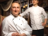 Executive chef Roland Ménard, left, and chef Francis Wolf in Manoir Hovey’s stately library.