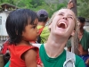 Expedition Amazon, 2010. Youth Ambassador Sierra Smith connects with a local child in Taquara, Brazil after trekking nearly 200 kilometres through dense jungle.