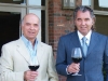 Alfredo DeGasperis (left) and son Jim DeGasperis (right) ruminate over a glass of Vineland’s finest at Eagles Nest Golf Club.