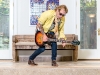 Wekerle rocks out poolside with a Gibson Les Paul autographed by Les Paul himself