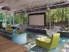 The family room includes a projection system with  roll-down screen and surround-sound