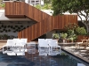 The Sunrise Pool staircase takes guests of The Modern Honolulu to a private sunset beach. Photography by: Evan Dion.