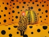 Kusama poses with Pumpkins Screaming About Love Beyond Infinity, one of her signature pieces | Photo Courtesy Of Yayoi Kusama